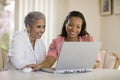 Mother and daughter sharing computer Royalty Free Stock Photo