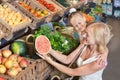 Mother with daughter shopping fruits Royalty Free Stock Photo
