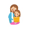 Mother and daughter sitting on the floor and reading a book, young woman with little daughter sitting on her knees Royalty Free Stock Photo