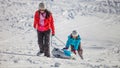 Mother And Daughter Sled Ride III Royalty Free Stock Photo