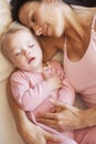 Mother And Daughter Sleeping In Bed Royalty Free Stock Photo