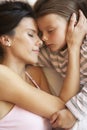 Mother And Daughter Sleeping In Bed Royalty Free Stock Photo