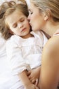 Mother And Daughter Sleeping In Bed Royalty Free Stock Photo