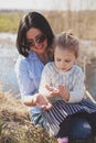 Mother and daughter spending time together outside