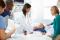 Mother And Daughter With Staff In Intensive Care Unit Royalty Free Stock Photo