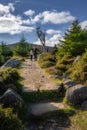 Mother and daughter standing on a mountain trail, hiking in Wicklow Mountains, Ireland