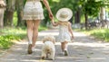 Mother and daughter strolling in sunny park with charming dog companion on a pleasant day