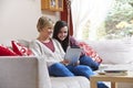 Mother and daughter on tablet computer Royalty Free Stock Photo