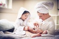 Mother and daughter tae care of etch other. Royalty Free Stock Photo