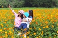 Mother and daughter taking photo in flower garden Royalty Free Stock Photo