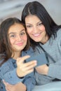 Mother and daughter taking photo themselves Royalty Free Stock Photo