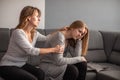 Mother and daughter taking photos and checking them Royalty Free Stock Photo