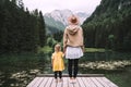 Mother and daughter together on nature. Family outdoor