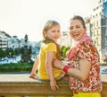 Mother and daughter tourists on Vaclavske namesti in Prague