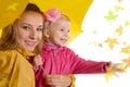 Mother and daughter under umbrella Royalty Free Stock Photo