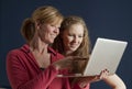 Mother and daughter using a laptop computer Royalty Free Stock Photo