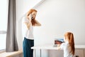 Mother and daughter using laptop computer at home Royalty Free Stock Photo