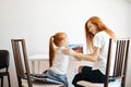 Mother and daughter using laptop computer at home Royalty Free Stock Photo