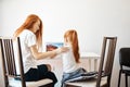 Mother and daughter using laptop computer at home Royalty Free Stock Photo