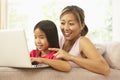 Mother And Daughter Using Laptop At Home Royalty Free Stock Photo