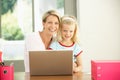 Mother And Daughter Using Laptop At Home Royalty Free Stock Photo