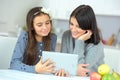 Mother and daughter using tablet computer Royalty Free Stock Photo