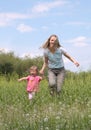 Mother and daughter walking Royalty Free Stock Photo