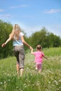 Mother and daughter walking