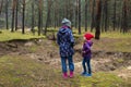 Mother and daughter walking in forest Royalty Free Stock Photo