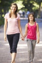 Mother And Daughter Walking Through Summer Park Royalty Free Stock Photo