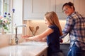 Mother With Daughter Washing Hands With Soap At Home To Stop Spread Of Infection In Health Pandemic Royalty Free Stock Photo