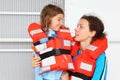 Mother and daughter wearing in life jacket Royalty Free Stock Photo