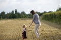 Mother and daughter in a wheat field Royalty Free Stock Photo