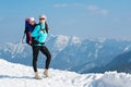 Mother and daughter in winter mountains