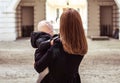 Mother and daughter walking away, horizontal, point-of-view Royalty Free Stock Photo