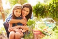 Mother And Daughter Working On Allotment Together Royalty Free Stock Photo