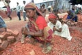 Mother and daughter working as stone breakers Royalty Free Stock Photo