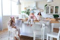 Mother, daughters spend weekend together. Young family with school girl, blonde toddler having fun together on Sunday morning Royalty Free Stock Photo