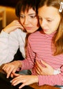 Mother & daugther looking at computer Royalty Free Stock Photo