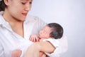 Mother day concept. The mother held the baby in her hand. Mom holding small baby. Woman hands holding newborn baby Royalty Free Stock Photo