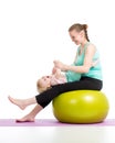 Mother doing gymnastic with baby on fitness ball Royalty Free Stock Photo