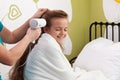 Mother drying her little girl`s hair after bath Royalty Free Stock Photo