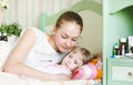 Mother embraces the sick child Royalty Free Stock Photo