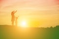 Mother encouraged her daughter out of the shadows at sunset