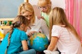 Mother explaining the world to her children Royalty Free Stock Photo