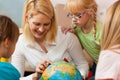 Mother explaining the world to her children Royalty Free Stock Photo