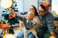 Mother, father and baby holding bauble Royalty Free Stock Photo