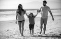 Mother father and child son spending time together. Family summer vacation. Parent dad mom walking with son holds hand Royalty Free Stock Photo