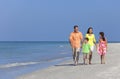 Mother Father and Children Family Walking On Beach Royalty Free Stock Photo