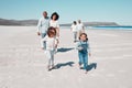 Mother, father and children play on beach to relax on summer holiday, vacation and weekend. Happy family, grandparents Royalty Free Stock Photo